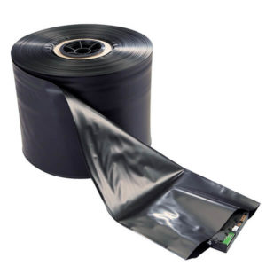 rollstock of black conductive packaging with electronic component