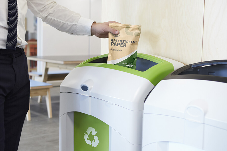 recyclable paper pouch being recycled